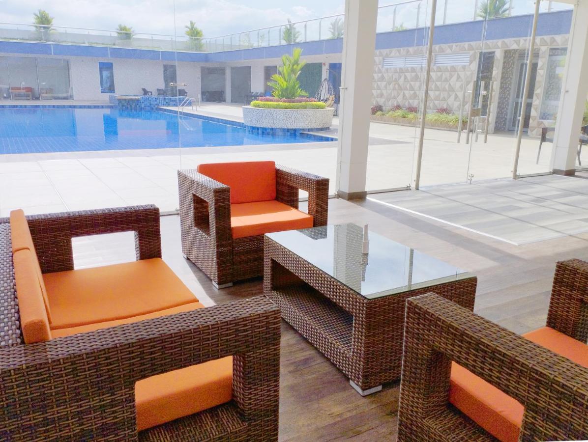 Hotel Royal Elim Internacional Cali Exterior foto WOVEN PE rattan