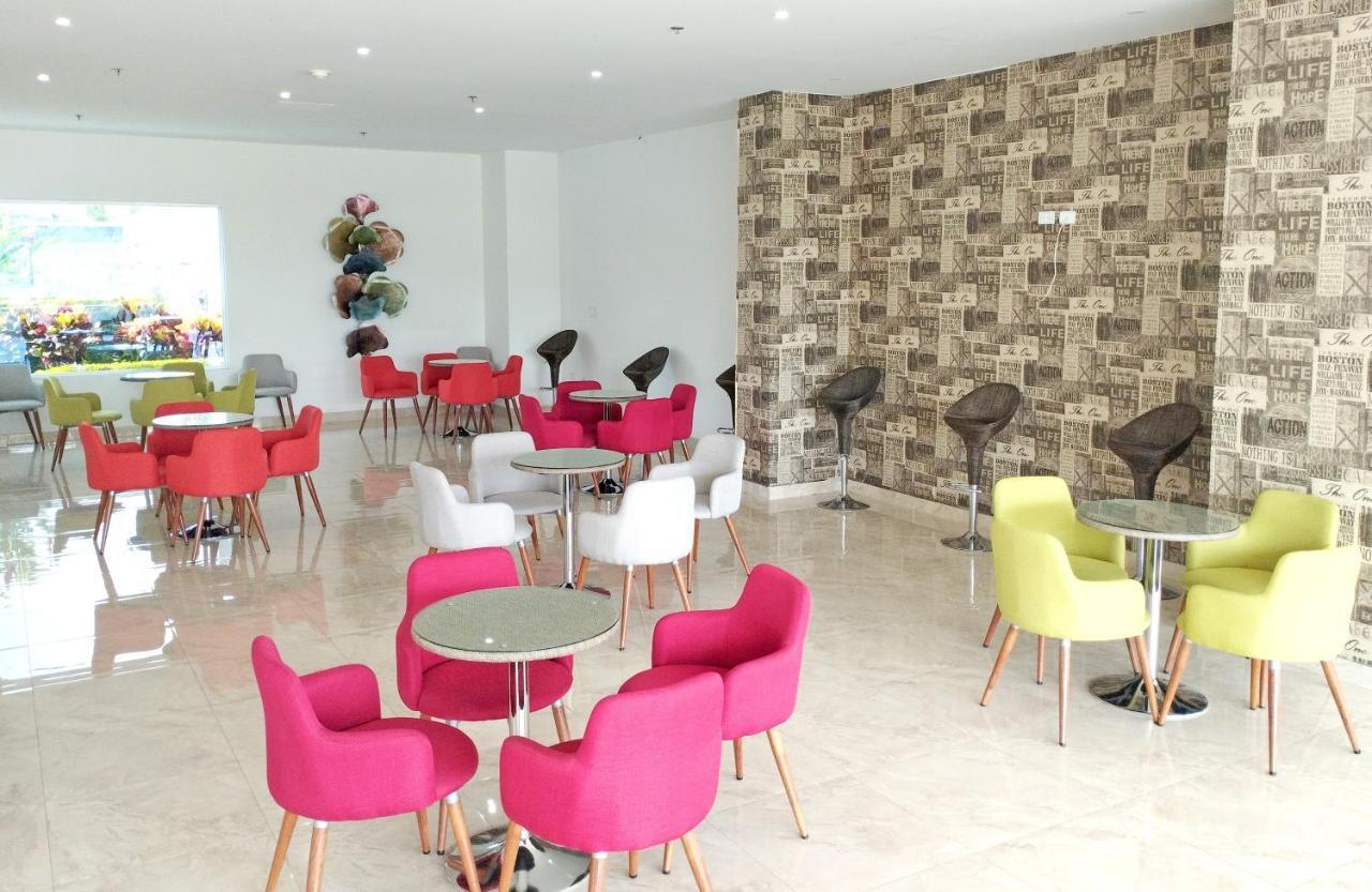 Hotel Royal Elim Internacional Cali Exterior foto Interior of the new library
