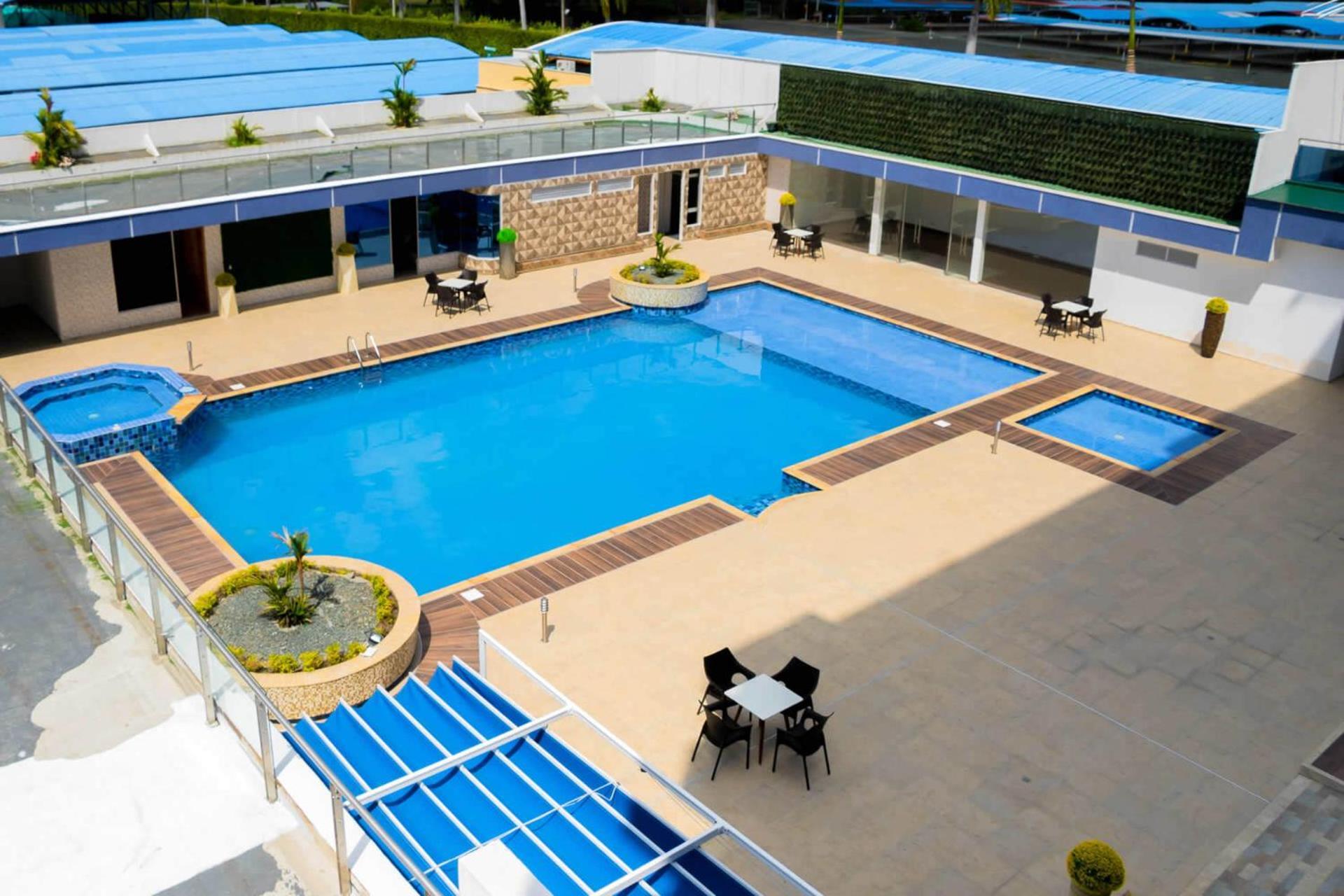 Hotel Royal Elim Internacional Cali Exterior foto The pool at the hotel