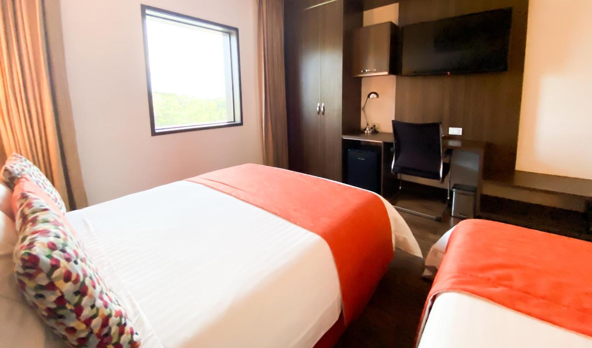 Hotel Royal Elim Internacional Cali Exterior foto A room at the hotel