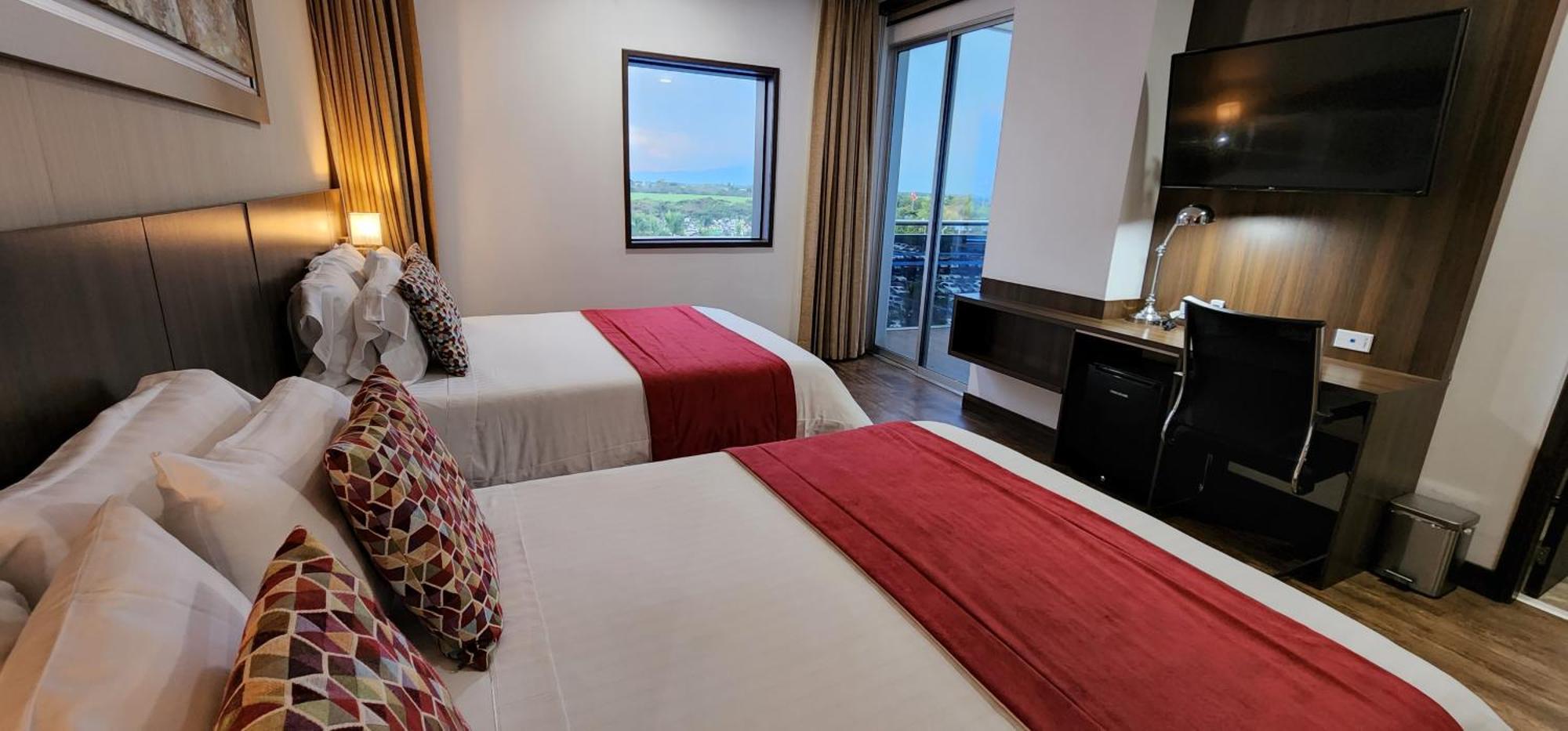 Hotel Royal Elim Internacional Cali Exterior foto A guest room at the hotel