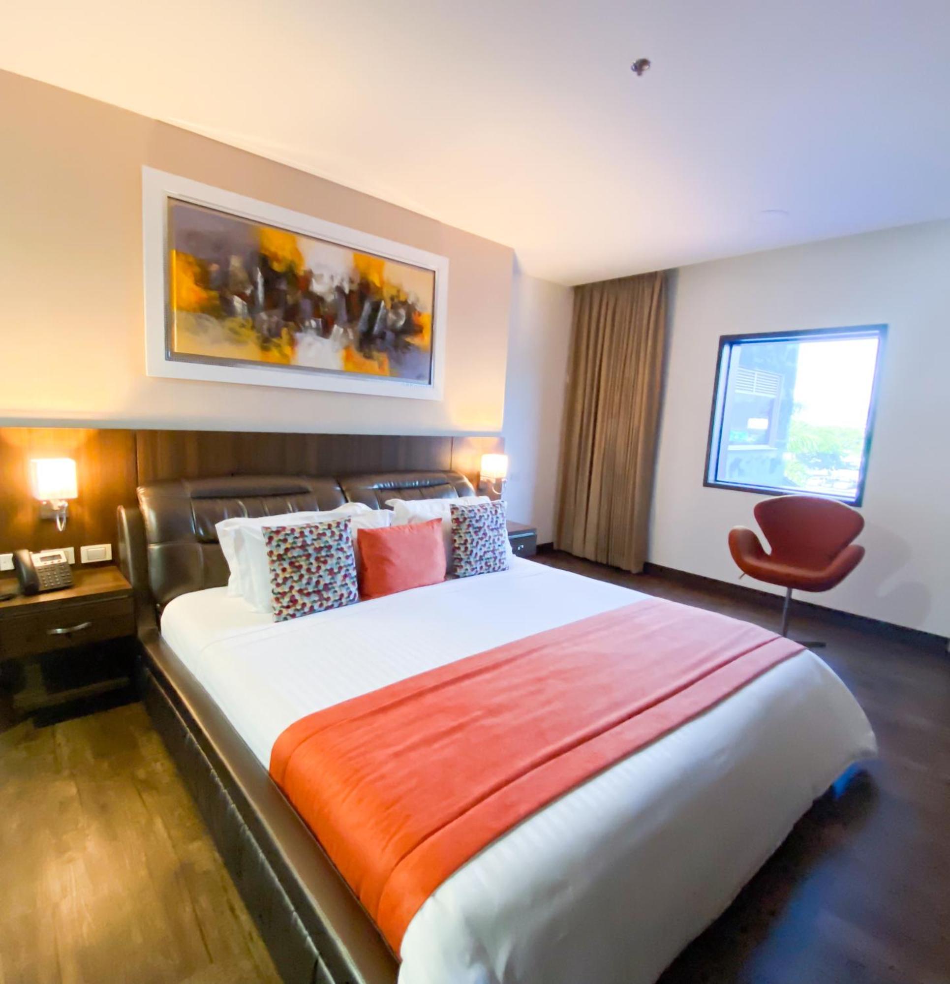Hotel Royal Elim Internacional Cali Exterior foto A bedroom at the hotel