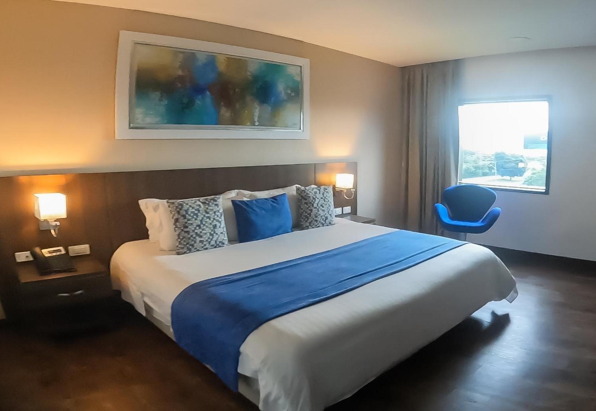Hotel Royal Elim Internacional Cali Exterior foto A room at the hotel