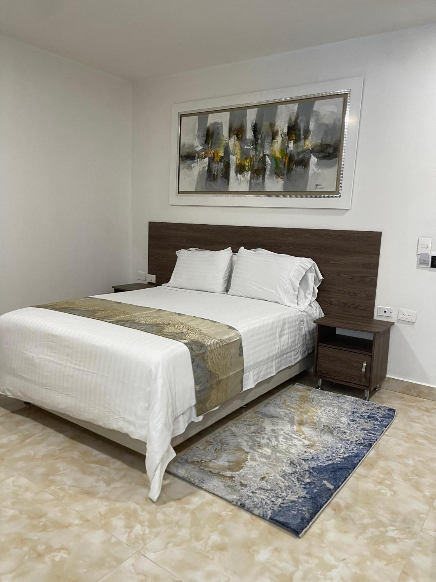 Hotel Royal Elim Internacional Cali Exterior foto A bedroom at the hotel