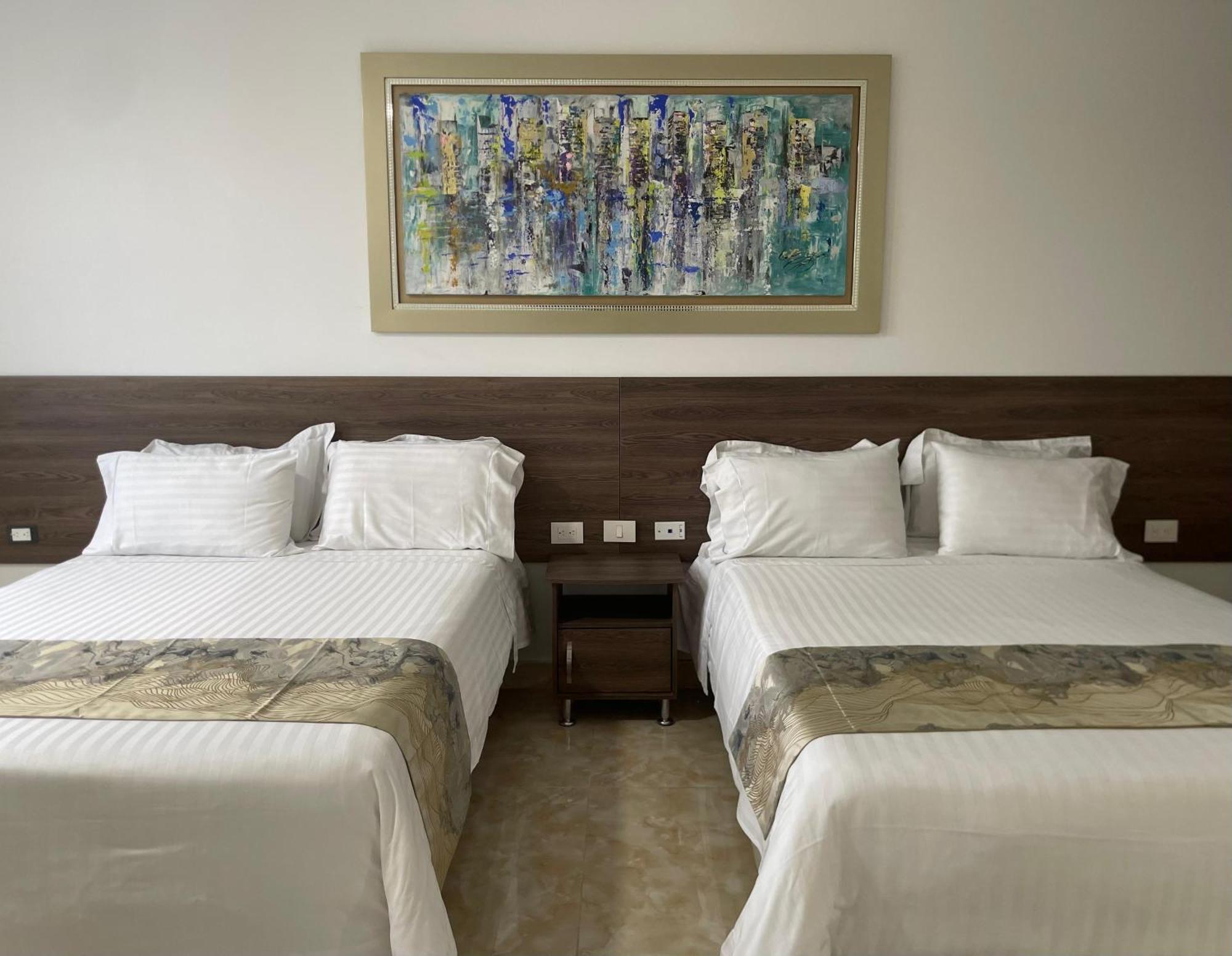 Hotel Royal Elim Internacional Cali Exterior foto A room at the hotel
